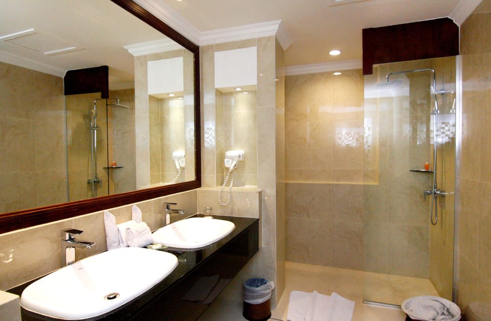 Shower, free toiletries, slippers, towels