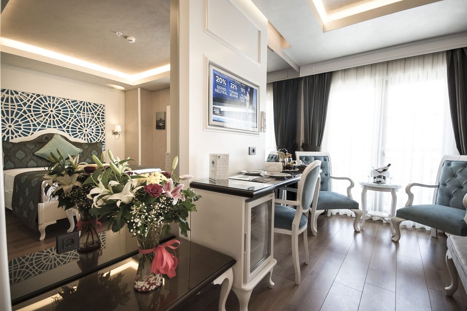 Superior Double or Twin Room | Living area | LCD TV