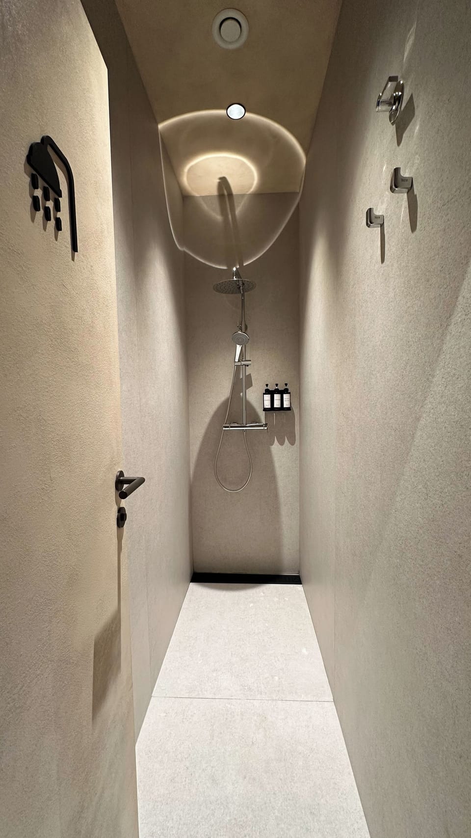 Shower, rainfall showerhead, towels, soap