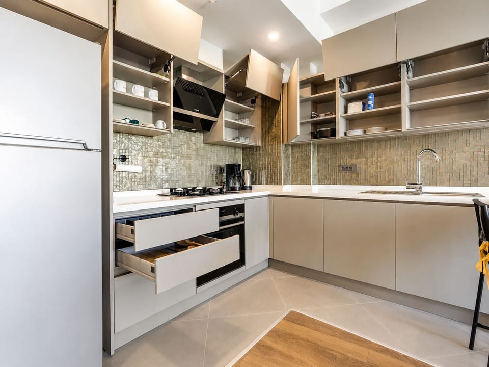 Luxury Condo, 1 Queen Bed with Sofa bed, Balcony, Pool View | Living area | 32-inch Smart TV with satellite channels