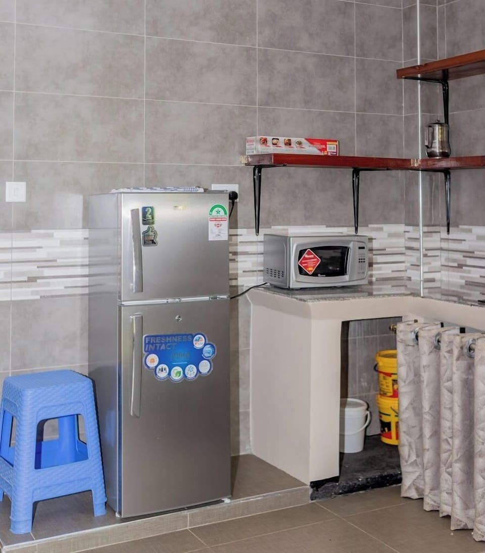 Family Bungalow, Garden View | Private kitchen | Fridge, microwave, cookware/dishes/utensils