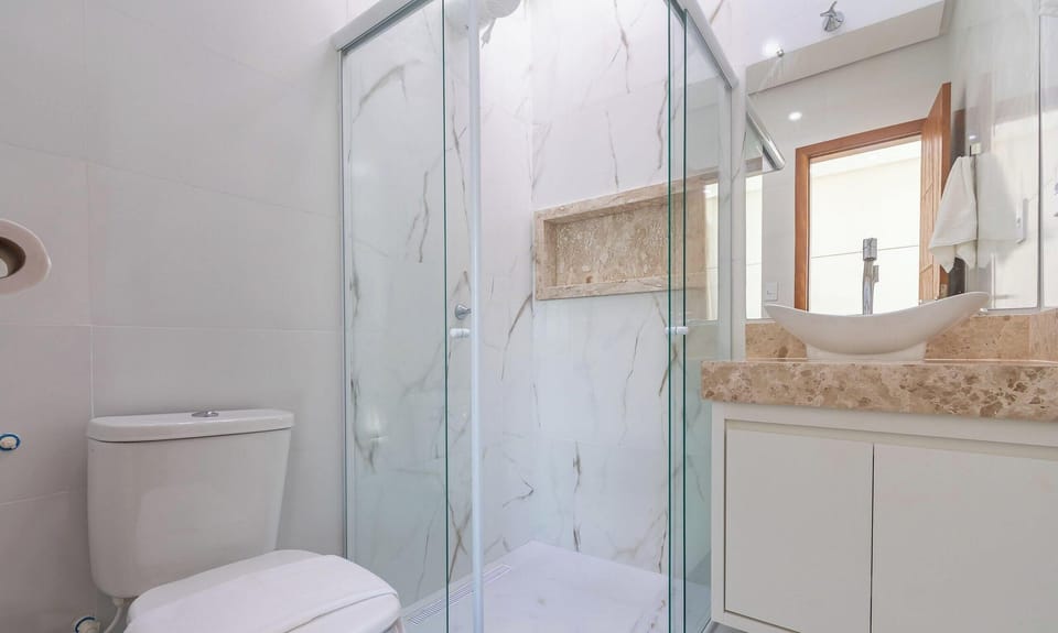 Basic Apartment | Bathroom | Shower, free toiletries