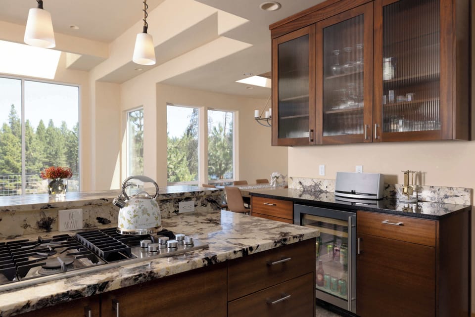The elegant kitchen offers ample space & all the comforts of home​