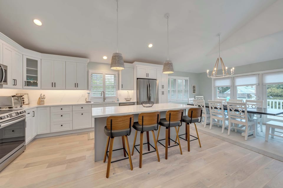 Prepare meals with ease in your gourmet kitchen featuring high-end appliances.