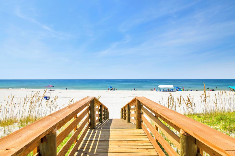 Steps from the beach via a private boardwalk