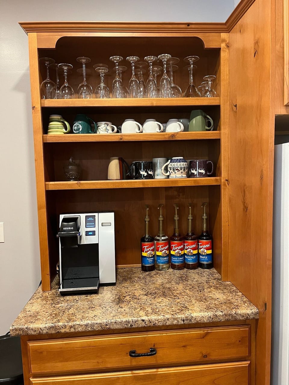 Kcups provided! If you like a lg pot of coffee, there's a regular machine too!