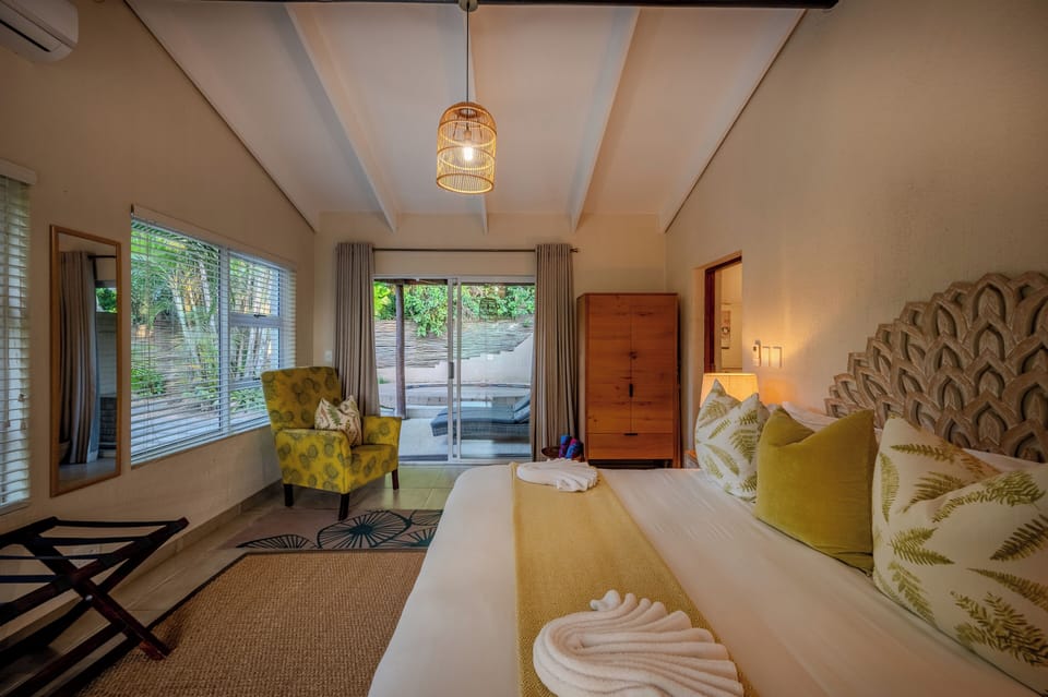 Executive Suite, Balcony, Garden View | In-room safe, iron/ironing board, WiFi (free)