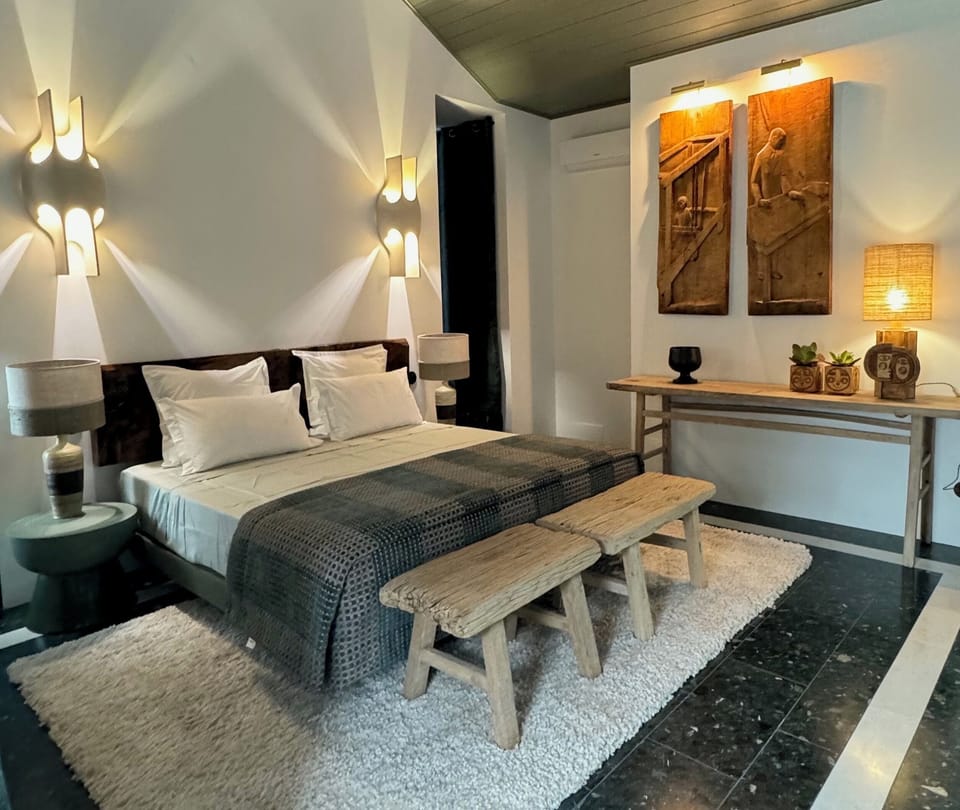 Deluxe Suite, 1 King Bed, Non Smoking, Pool View | In-room safe, individually decorated, individually furnished