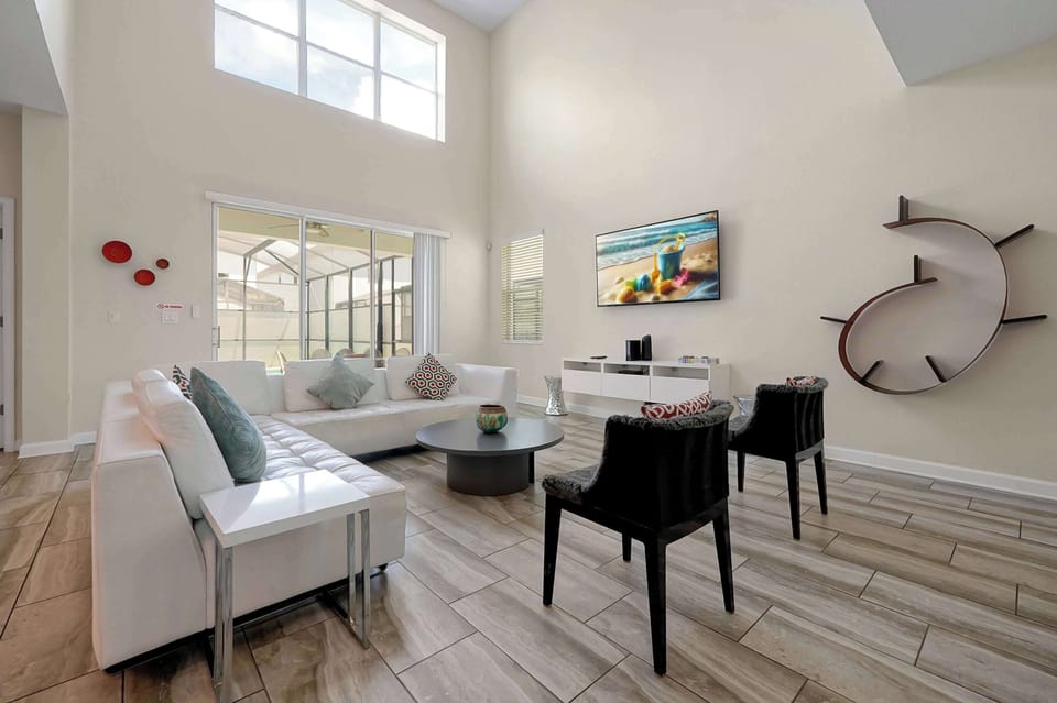 Bright living room with tall ceilings
