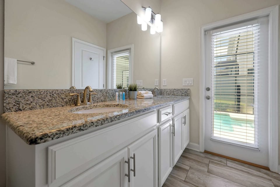 Bathroom with direct access to the pool area 