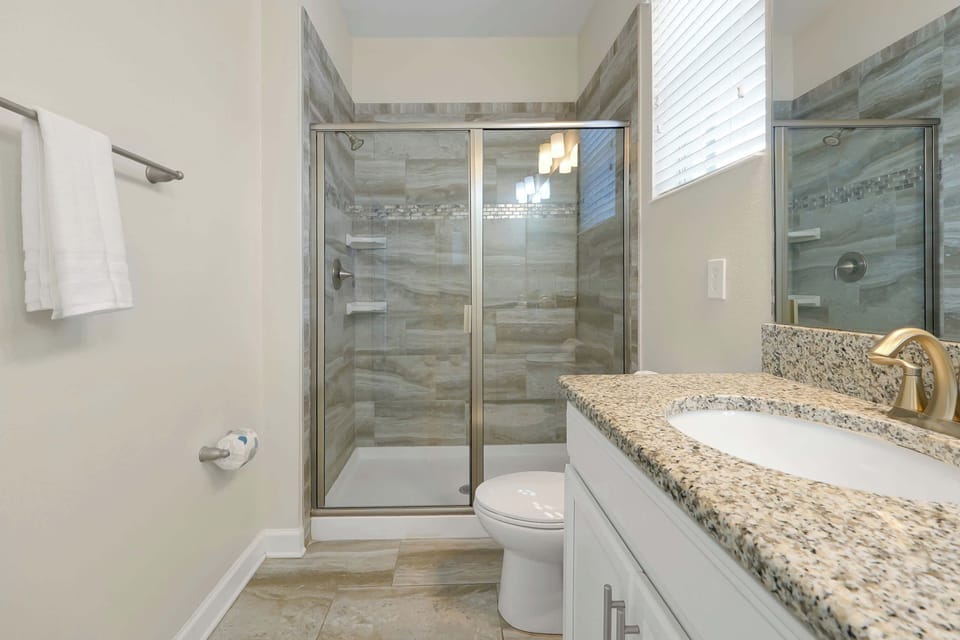 Stylish bathroom with walk-in shower