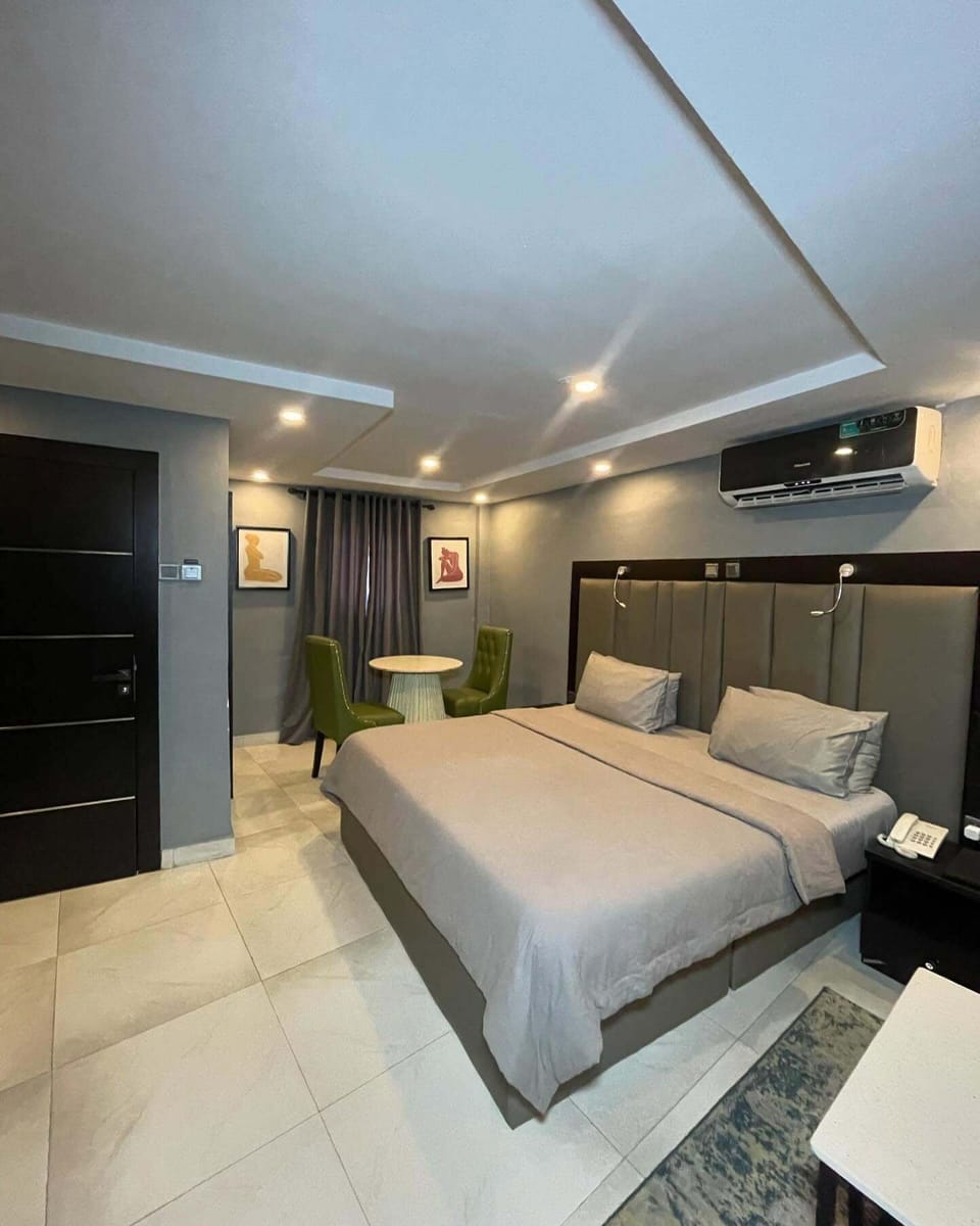 Economy Room, Balcony, City View | Desk, laptop workspace, blackout drapes, soundproofing