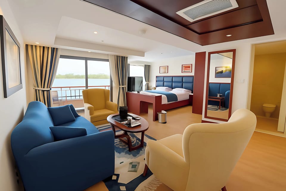 Deluxe Suite, Balcony, River View | In-room safe, laptop workspace, blackout drapes
