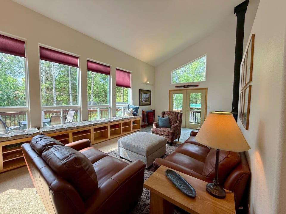 Another shot of living room with plenty of natural light.