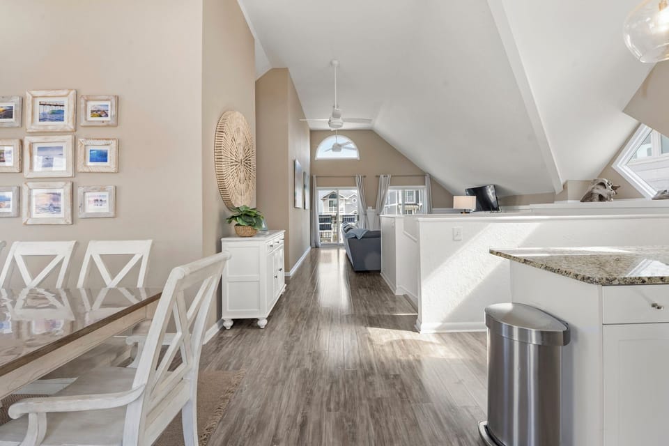 GR2401: Come Away | Top Level Dining Area Into Living Area