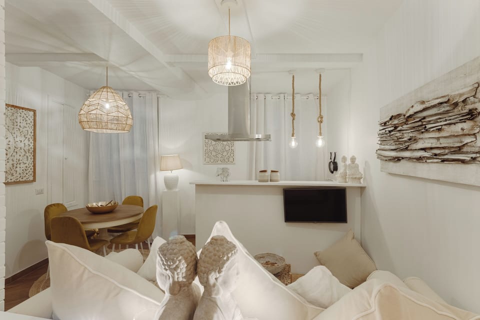 Luxury Apartment, City View | Living area | Flat-screen TV