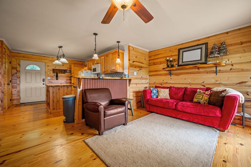 Living room view 4 (sofa and chair, ceiling fan)