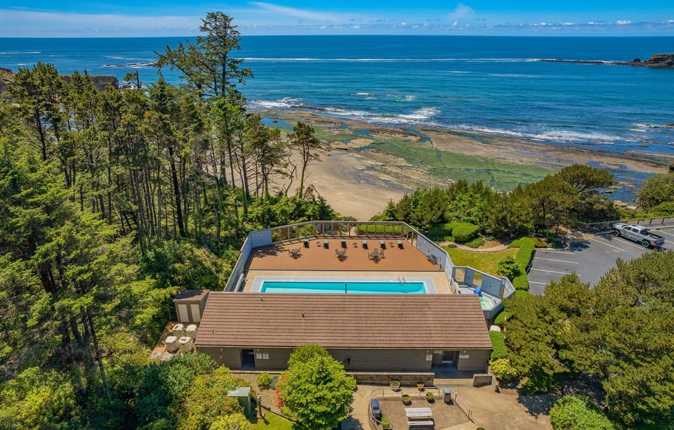 Overlooking the breathtaking coastline, the resort's heated pool invites guests to unwind while enjoying the tranquil sounds of the ocean.
