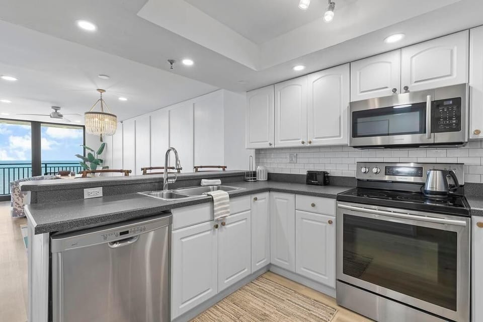 Condo, Multiple Beds (Moontide B707) | Private kitchen | Oven, toaster