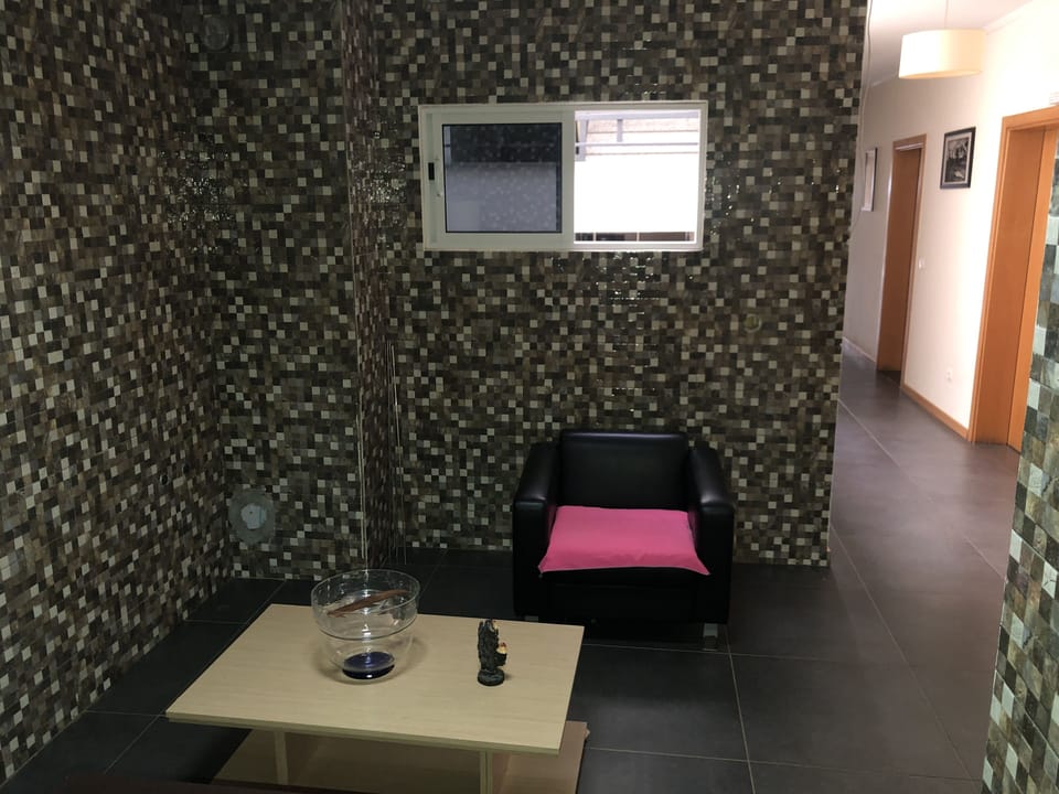Comfort Single Room | Living area | Flat-screen TV