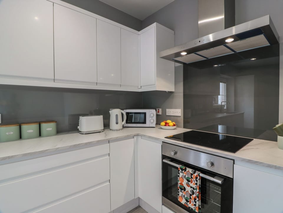 Fridge, microwave, toaster, cookware/dishes/utensils