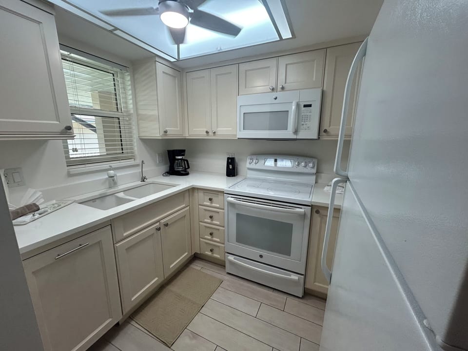 Fully equipped kitchen with everything needed for cooking during extended stays.
