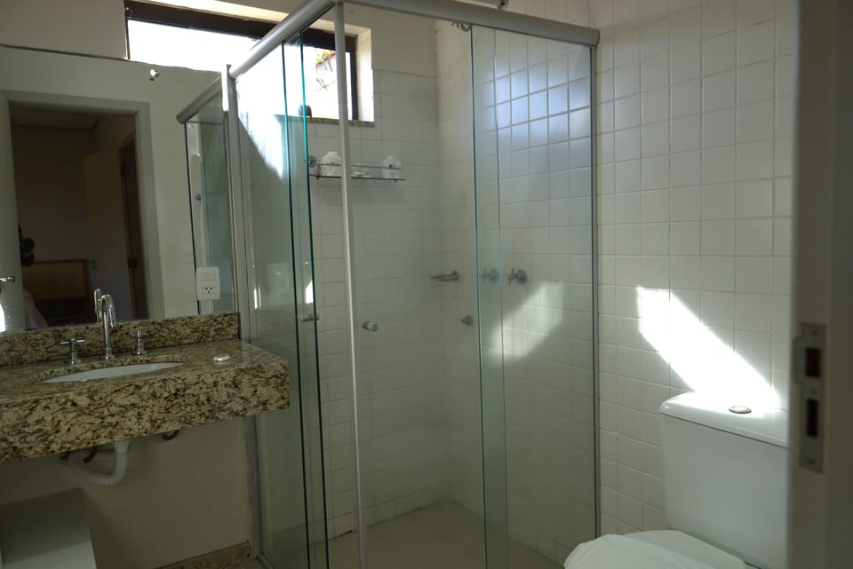 Standard Quadruple Room | Bathroom | Shower, towels, soap, shampoo