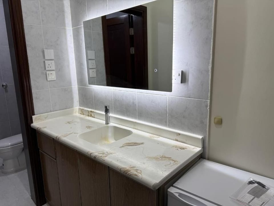 Deluxe Quadruple Room, City View | Private kitchen | Mini-fridge