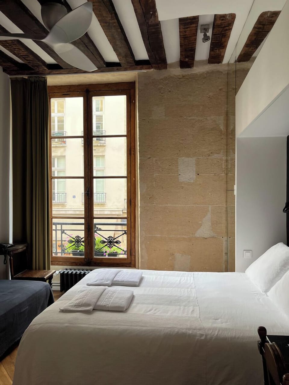 Hypo-allergenic bedding, blackout drapes, iron/ironing board, free WiFi