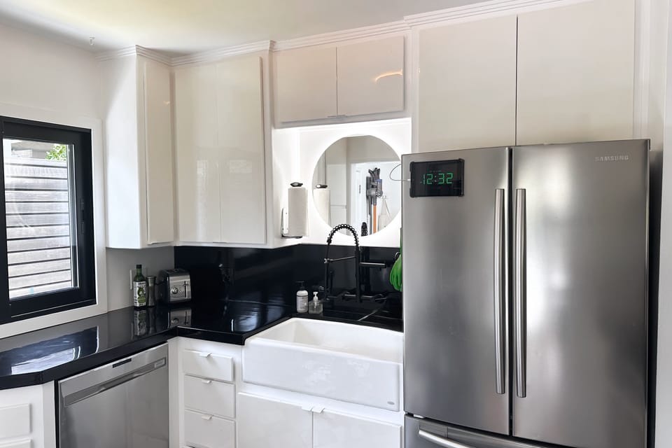 Walking into kitchen from dining room.