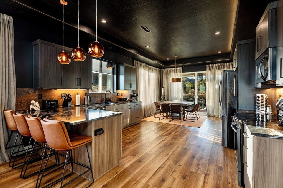 Kitchen has additional counter sitting for 4.