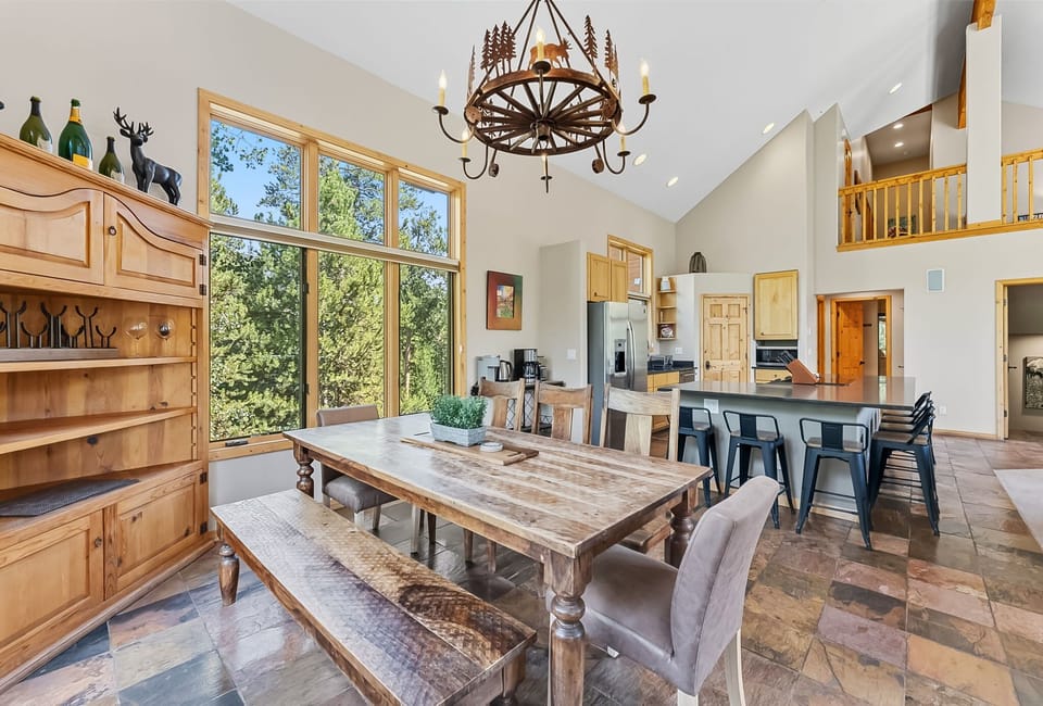 
Dining area (main floor): 8-person dining table, island seating for 9