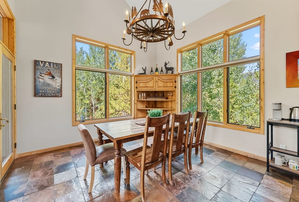 
Dining area (main floor): 8-person dining table, island seating for 9