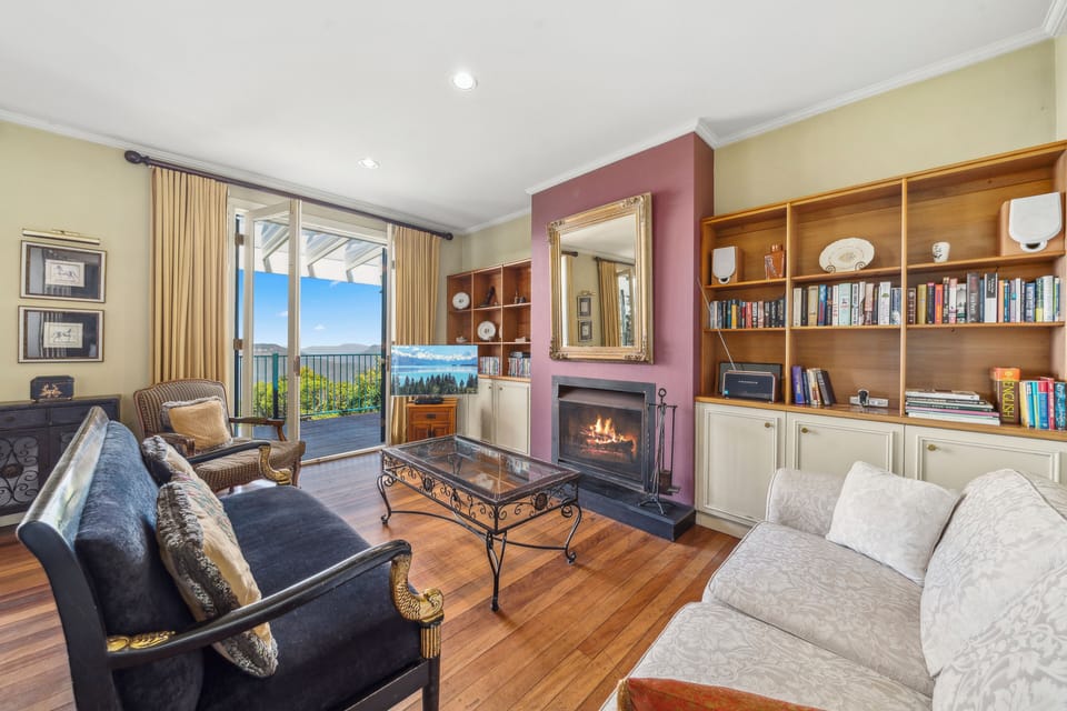 Lounge room with French doors opening to stunning views
