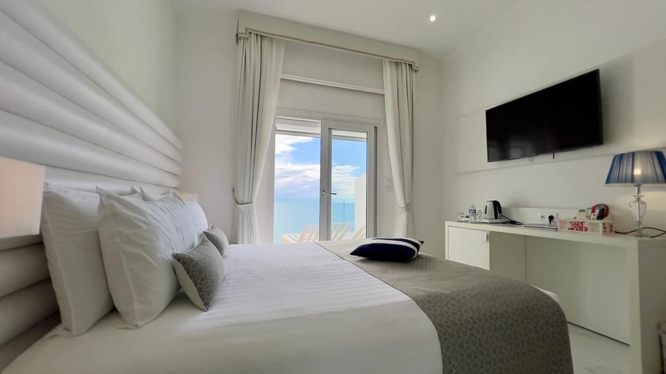 Minibar, in-room safe, desk, laptop workspace