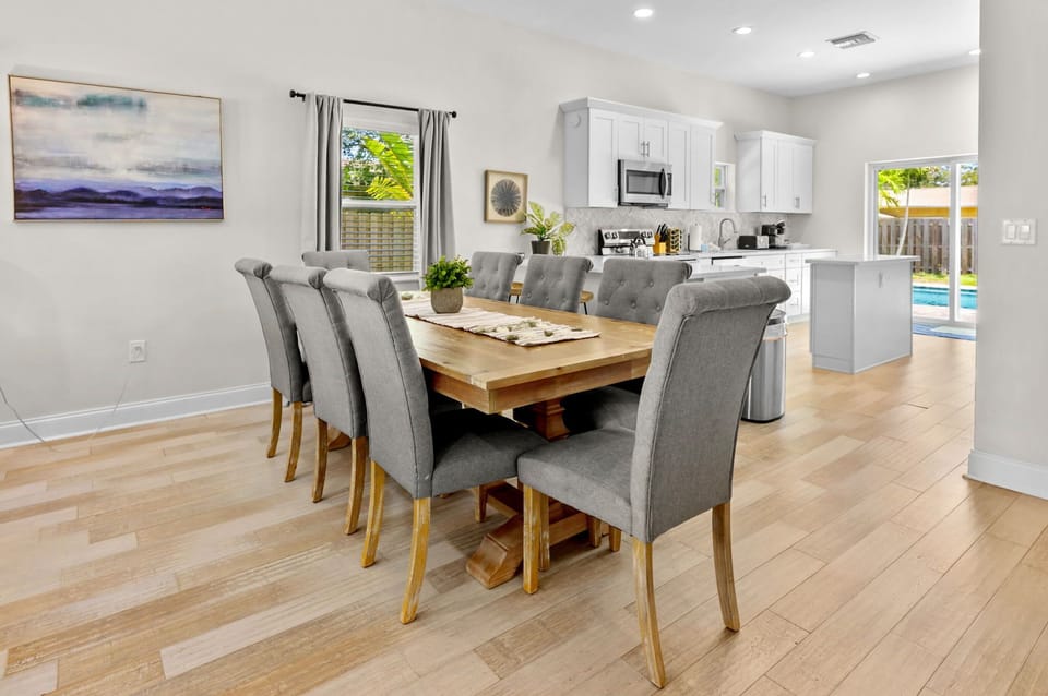 Gather 'round for good times and great meals! This spacious dining area is perfect for family feasts and vacation celebrations. Plenty of room for everyone! 