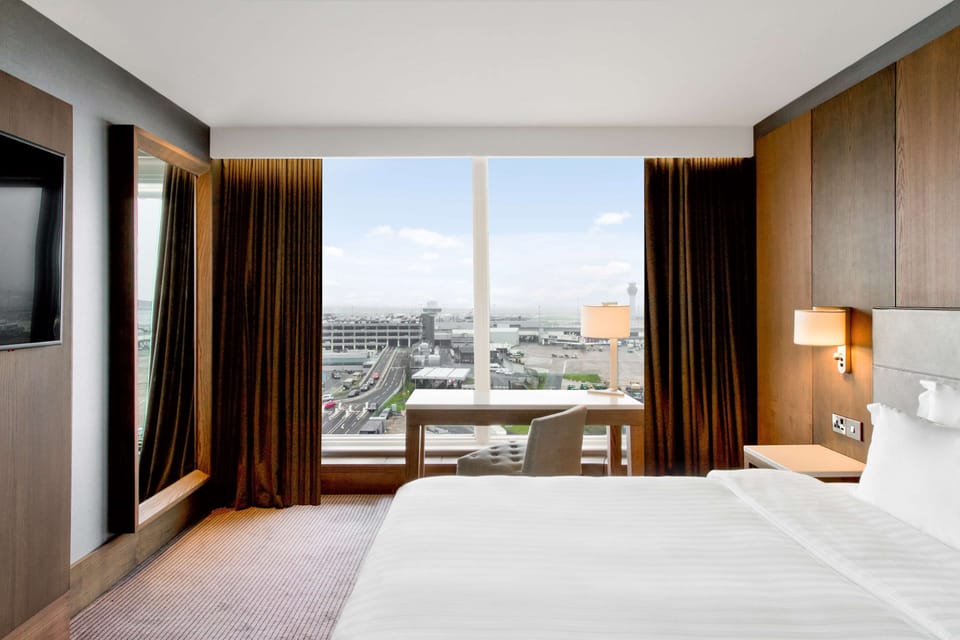Hypo-allergenic bedding available, in-room safe, desk, laptop workspace