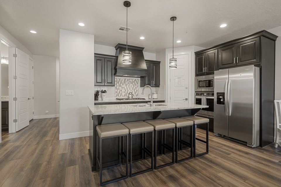 Townhome, 4 Bedrooms | Private kitchen | Fridge, oven, coffee/tea maker, toaster