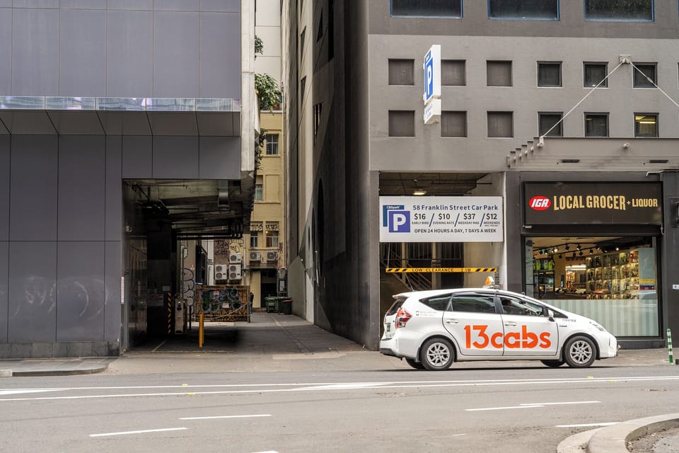 Secure on-site stacker parking, entry via 58 Franklin laneway