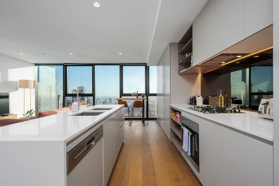 Chef-ready kitchen with gas cooktop & Nespresso, Level 63 city views