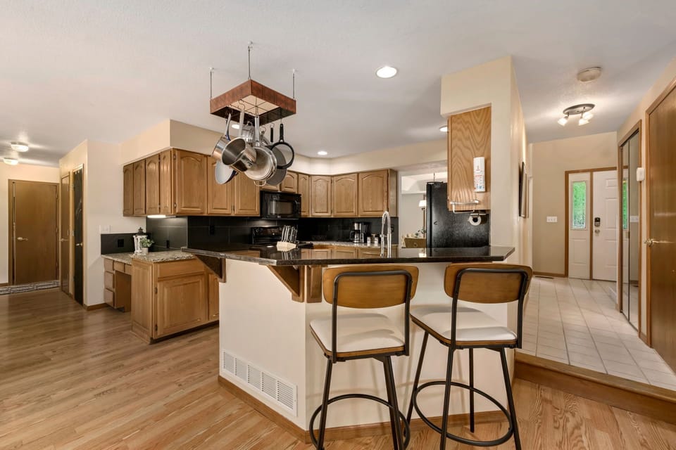 House, Multiple Beds, Patio, Garden View (2765 27th CT SW) | Private kitchen | Coffee/tea maker, fridge, microwave, oven