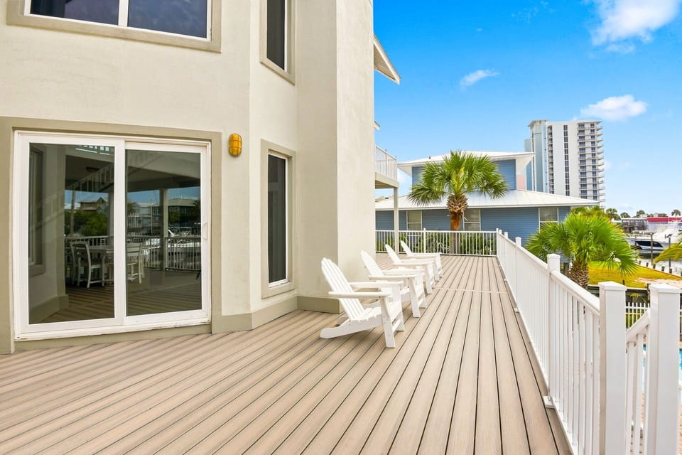 Main floor deck with stairs to the private pool area