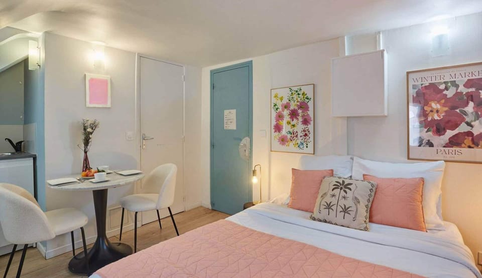 Apartment | Laptop workspace, iron/ironing board, bed sheets