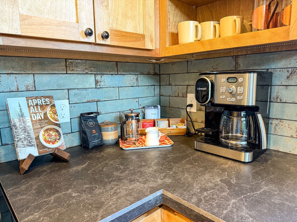 A coffee station with all the options to get your morning started right. Coffee and tea provided.