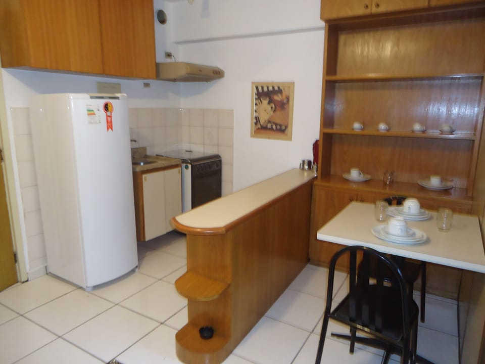 Fridge, stovetop, cookware/dishes/utensils