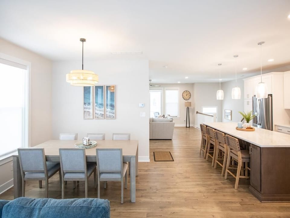 Large dining table with seating for six—ideal for group meals and game nights.
