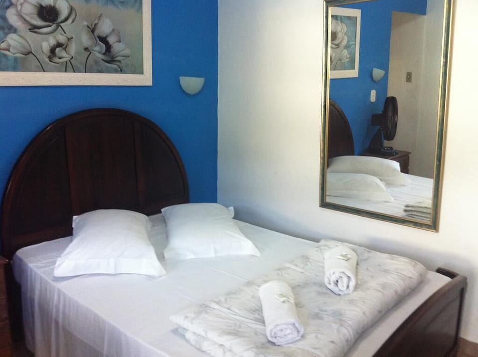 Basic Double Room | Minibar, iron/ironing board, bed sheets