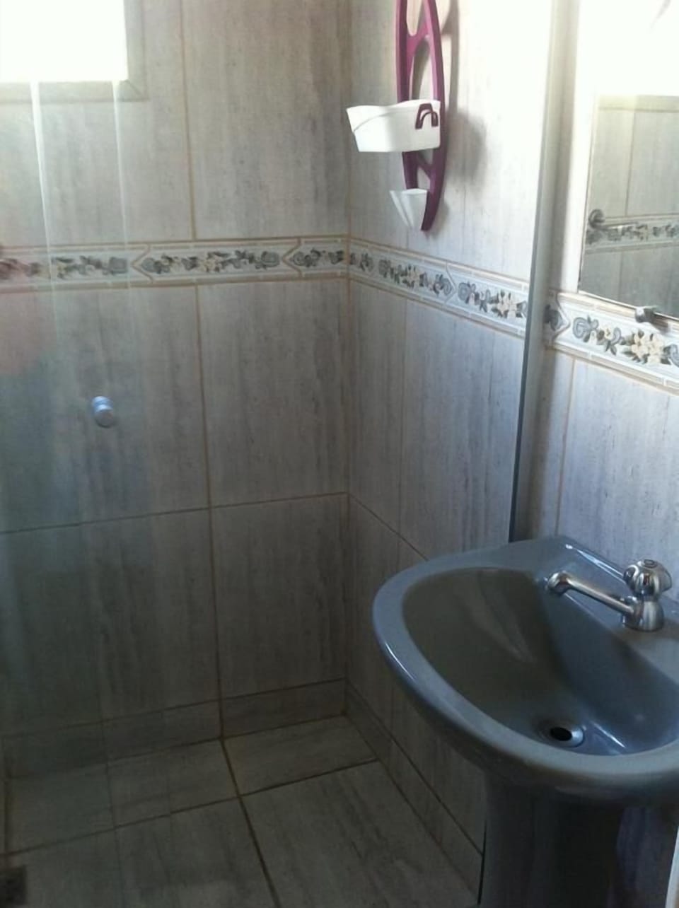 Shower, towels, soap, toilet paper