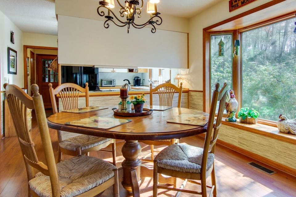 Dining Area | Warm Wood Table | Mountain Views & Natural Light