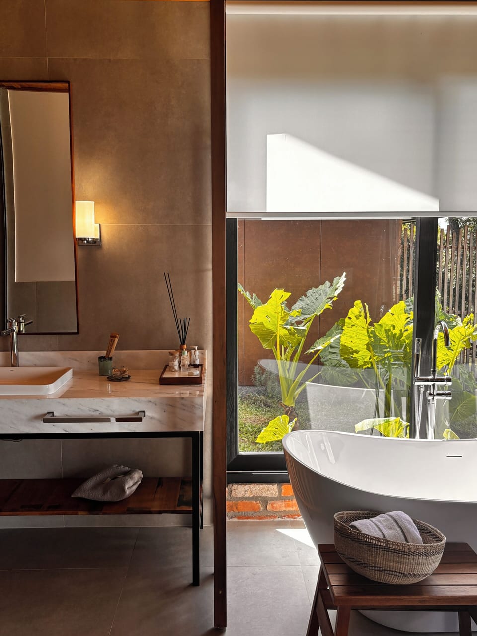 Separate tub and shower, hair dryer, slippers, bidet